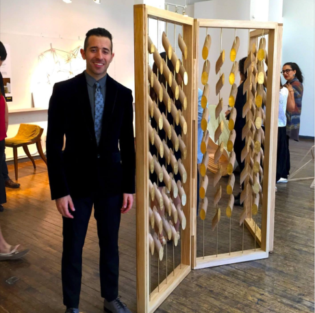 Bronsin Ablon with one of his designs.